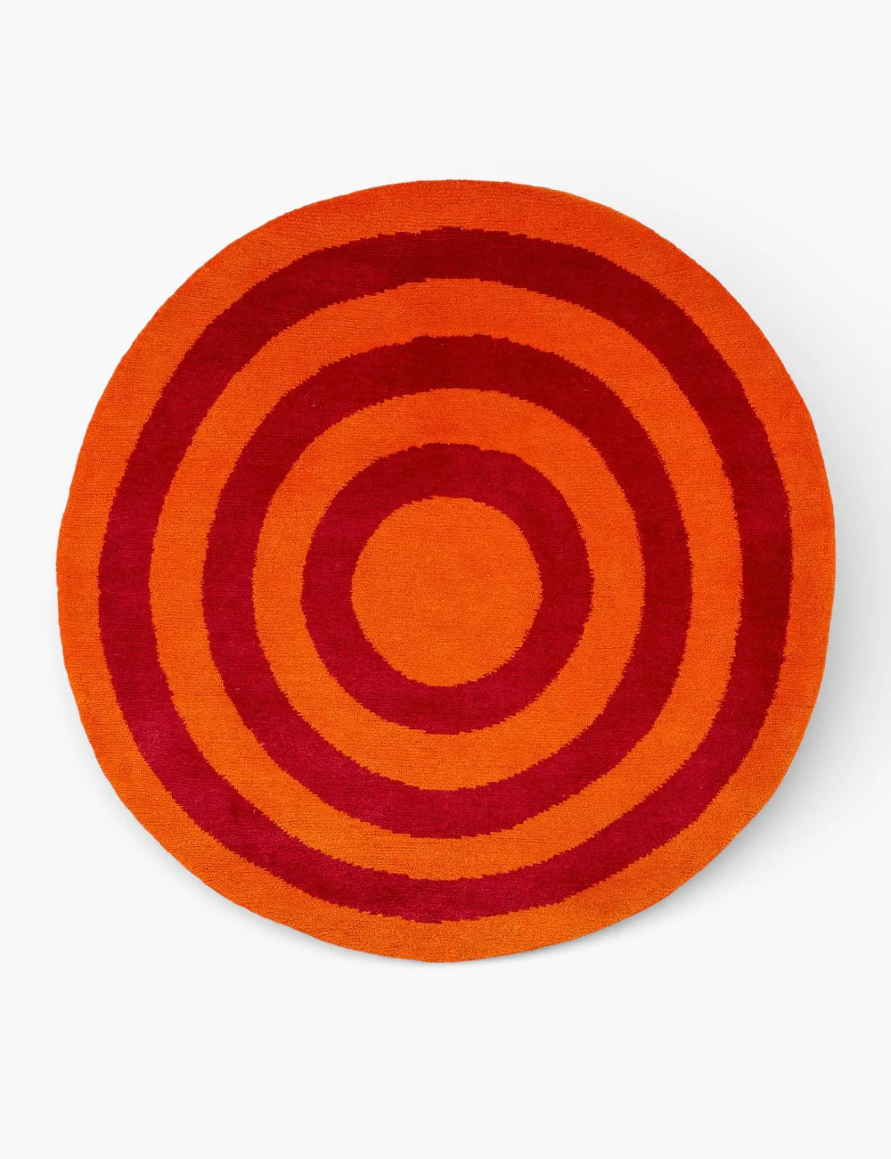 Tapis rond en soie et laine à anneaux orange et rouges Bullseye by Joseph Carini